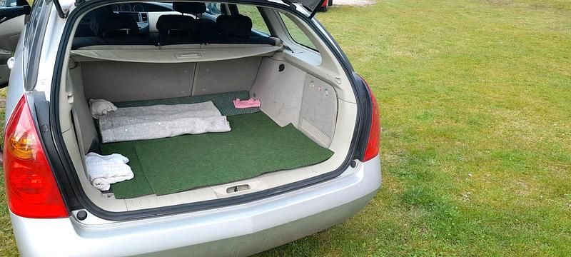 Gebraucht Nissan Primera 115 PS (84 kW) 2003 Silber Kombi