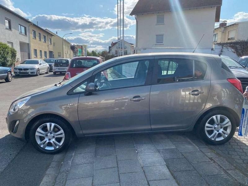 Gebraucht Opel Corsa Active 95 PS (69 kW) 2013 Muskatgrau/muskat braun(m2) Kleinwagen