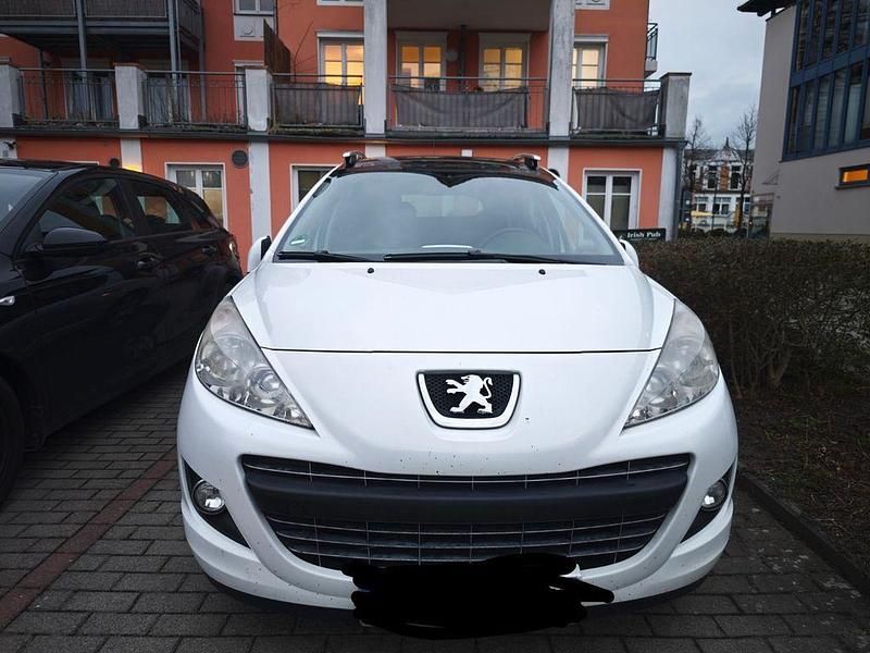 Gebraucht Peugeot 207 Premium 92 PS (67 kW) 2012 Weiß Kombi