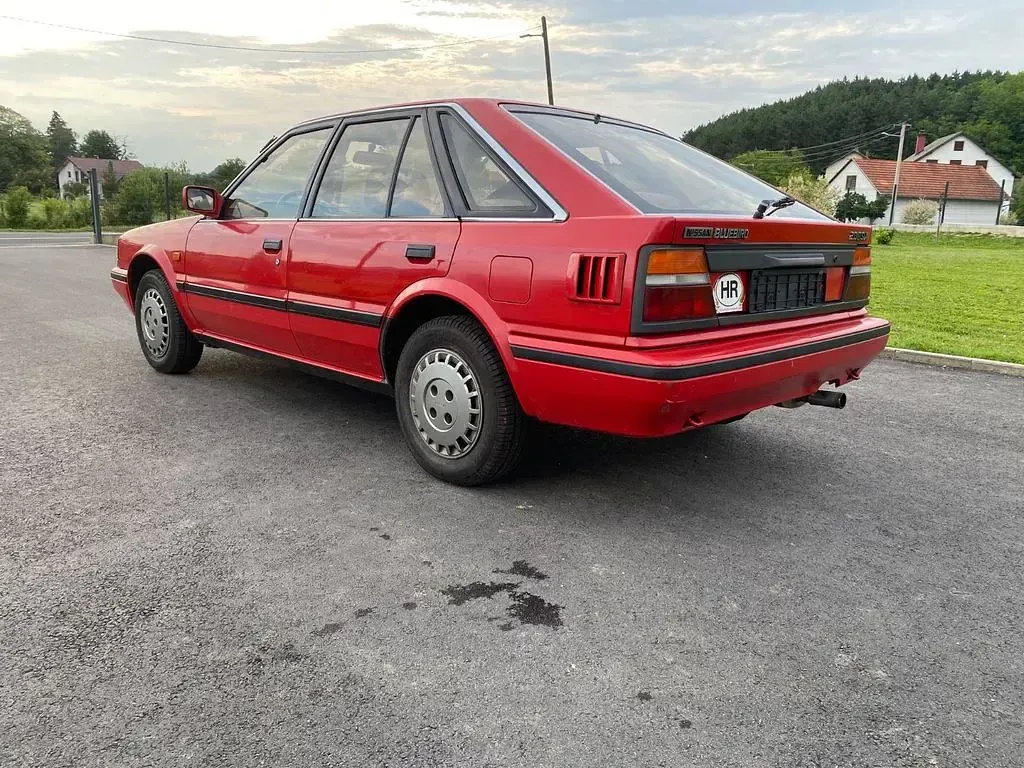 Gebraucht Nissan Bluebird 60 PS (44 kW) 1994 Rot Limousine