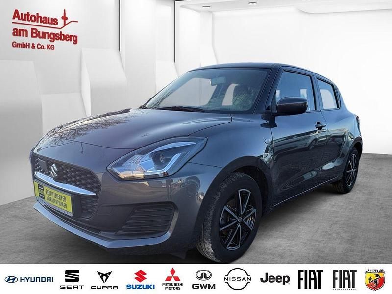 Grau Gebraucht 2021 Suzuki Swift Club Limousine | 12.990 € (Fairer Preis) - Bild 1/3