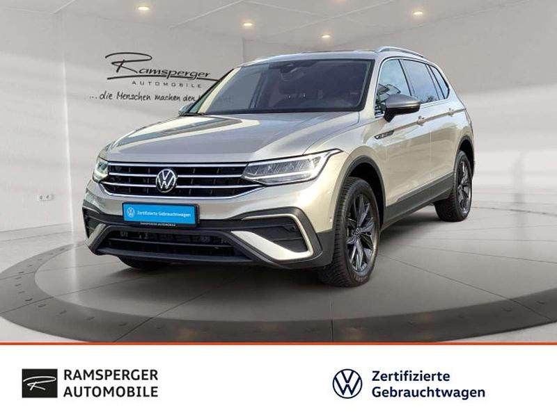 Silber (ivory silver metallic) Gebraucht 2024 VW Tiguan Allspace Move SUV | 39.490 € (Fairer Preis) - Bild 1/4