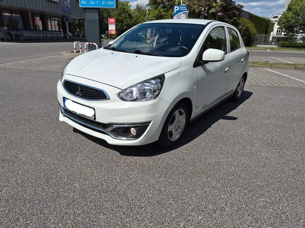 Gebraucht Mitsubishi Space Star 71 PS (52 kW) 2016 Weiß Kleinwagen