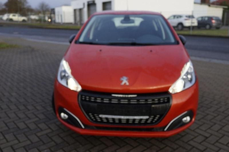 Gebraucht Peugeot 208 Active 82 PS (60 kW) 2015 Orange Kleinwagen