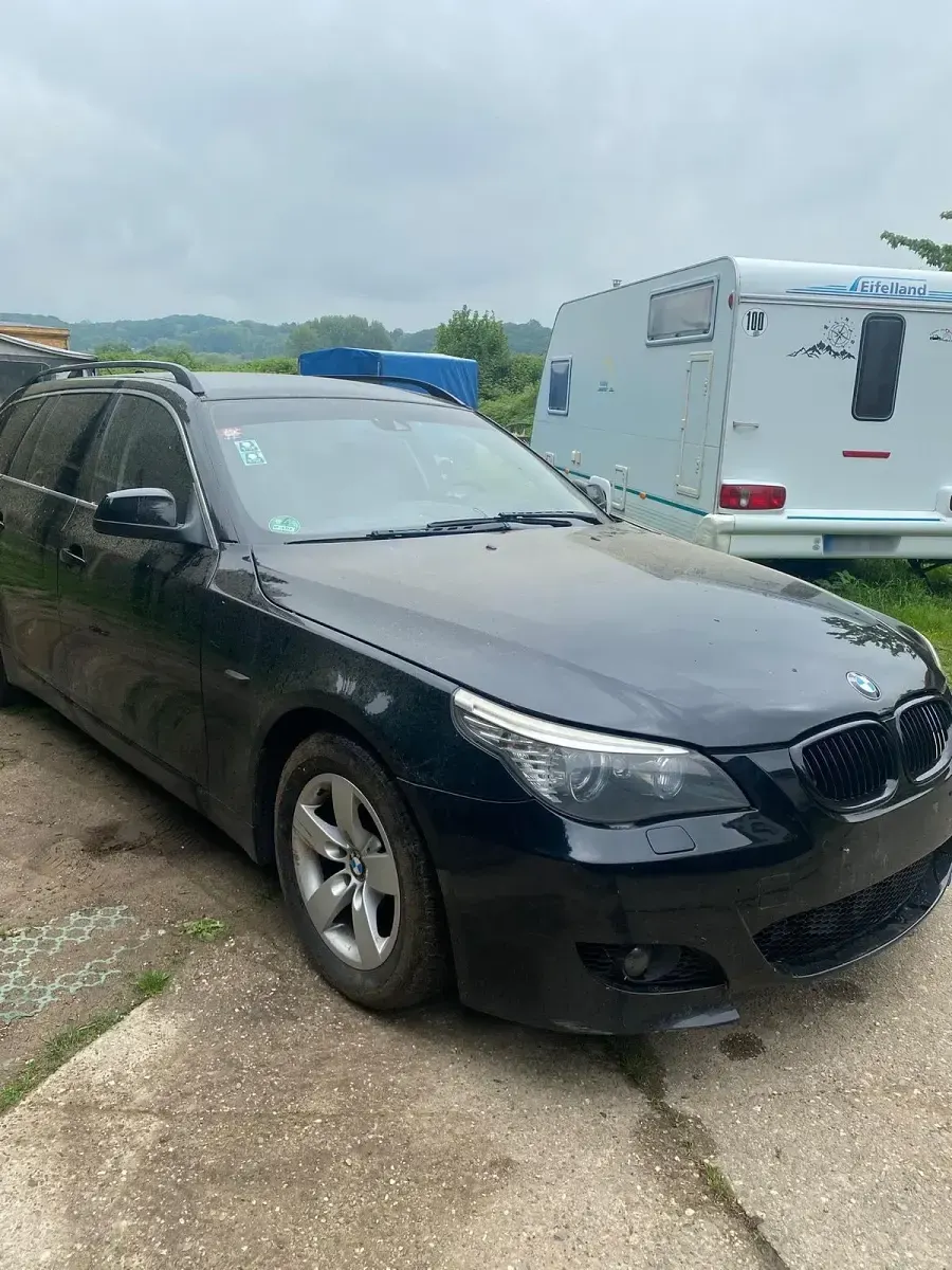Second-hand BMW 520 163 CP (119 kW) 2009 Negru Break