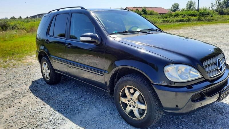Schwarz Gebraucht 2003 Mercedes ML270 SUV | 3.490 € - Bild 1/4