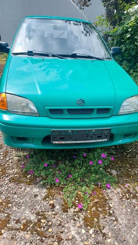 Grün Gebraucht 1998 Suzuki Swift Kleinwagen | 800 € - Bild 1/4