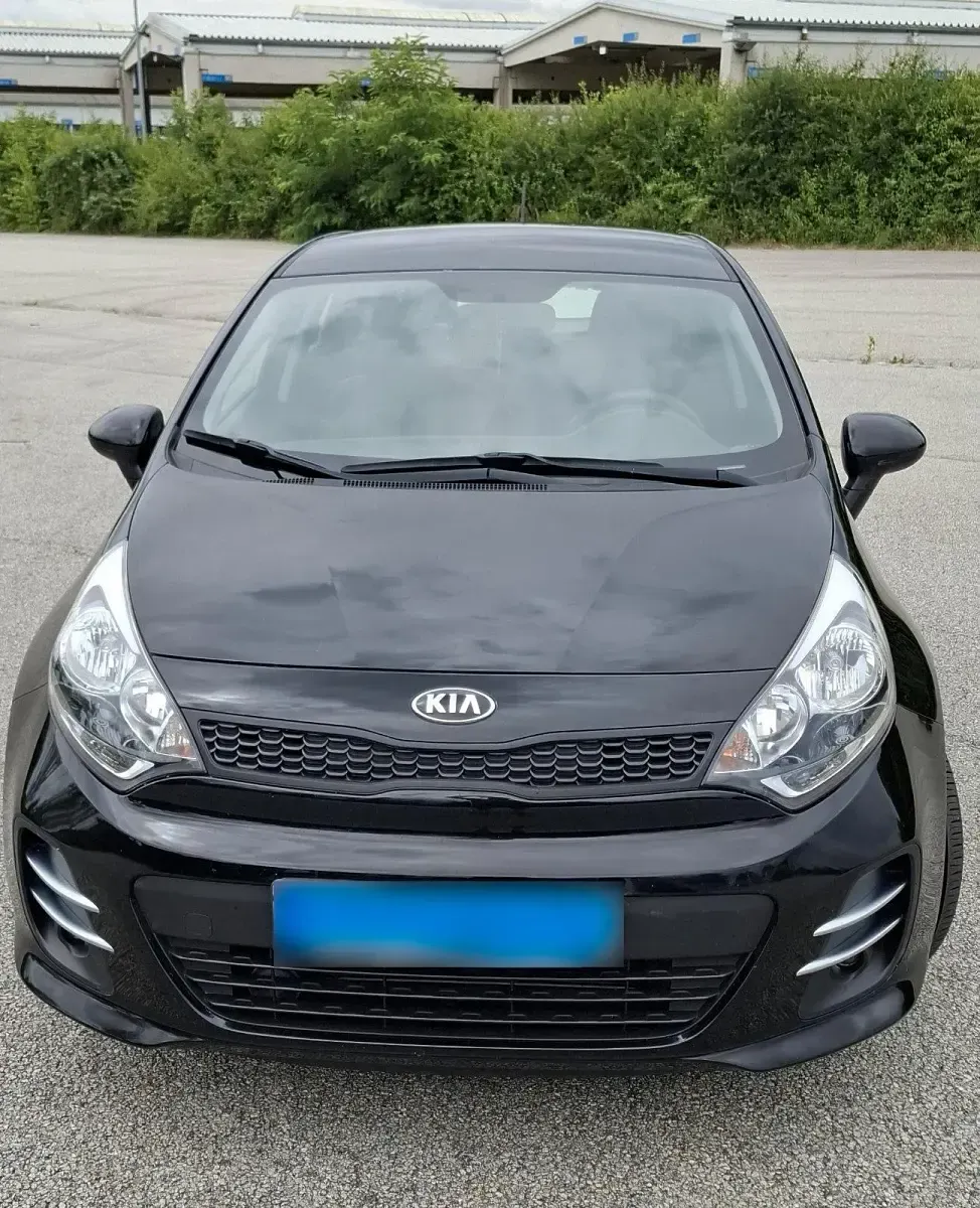 Gebraucht Kia Rio 84 PS (61 kW) 2016 Schwarz Kleinwagen