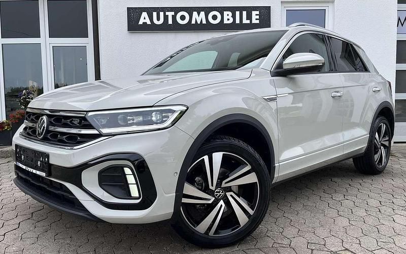 Grau Gebraucht 2024 VW T-Roc R-line SUV | 31.979 € (Fairer Preis) - Bild 1/4