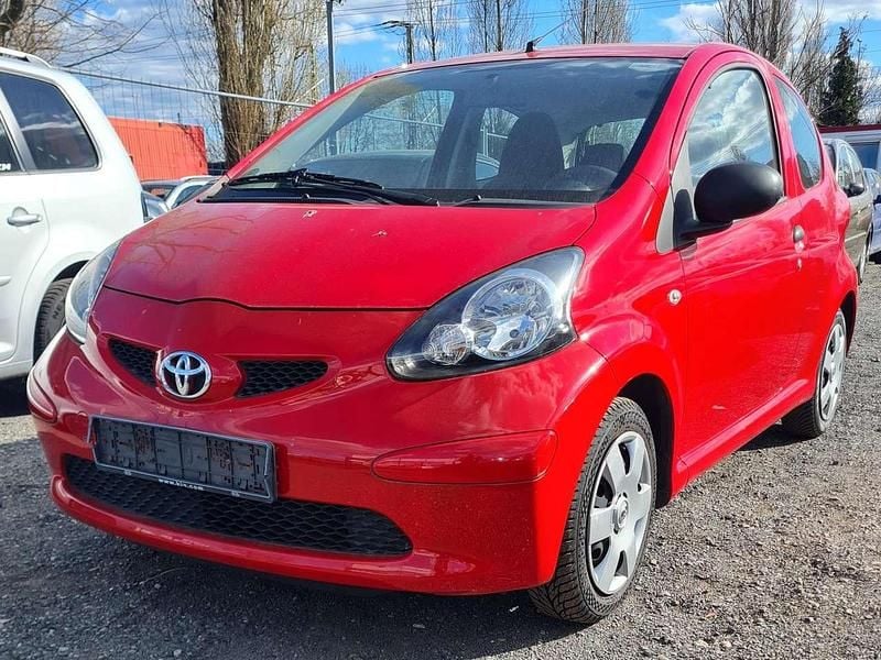 Super red v Gebraucht 2008 Toyota Aygo Basis Kleinwagen | 1.750 € (Fairer Preis) - Bild 1/4