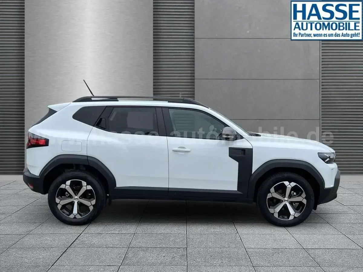 Nowe Dacia Duster Journey 101 KM (74 kW) 2025 Biały SUV