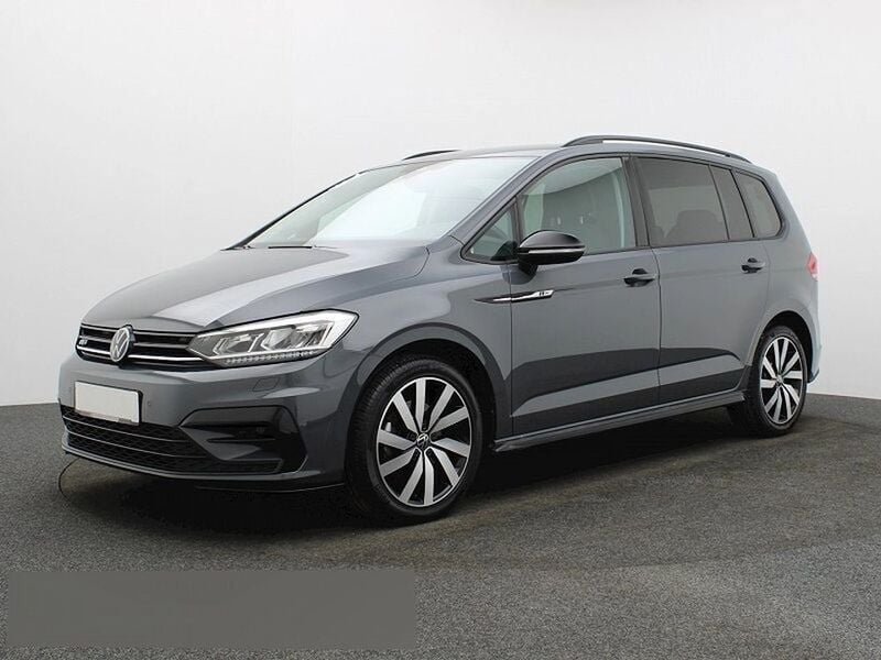 Grau Gebraucht 2024 VW Touran Highline Van / Kleinbus | 39.589 € (Etwas zu teuer) - Bild 1/4