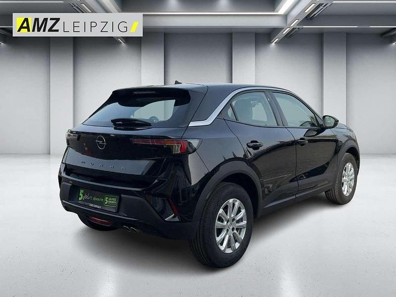 Gebraucht Opel Mokka Enjoy 131 PS (96 kW) 2023 Lackierung schwarz perla nera/ SUV