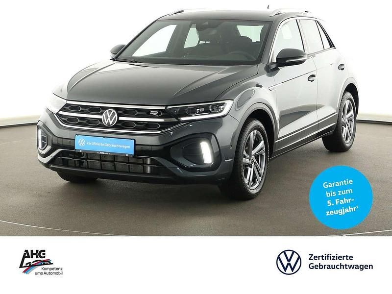 Indiumgrau metallic Gebraucht 2024 VW T-Roc R-line SUV | 28.790 € (Fairer Preis) - Bild 1/3