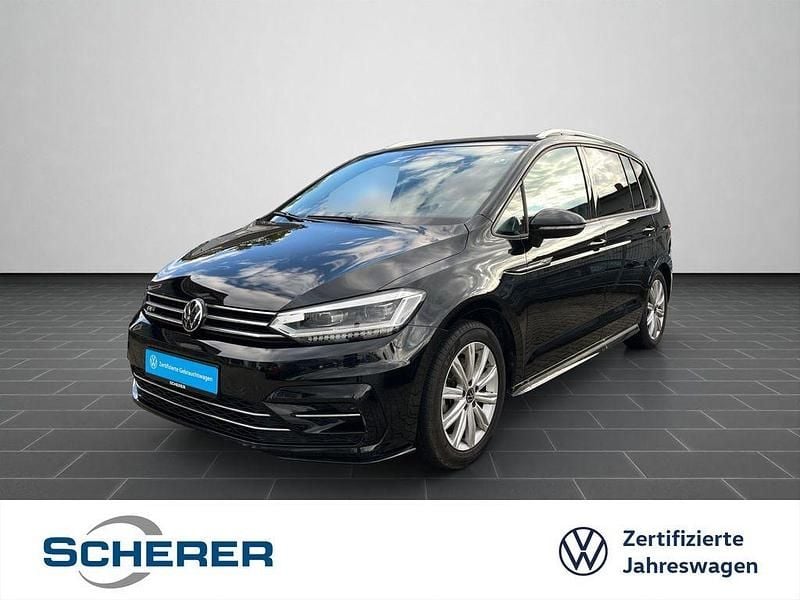 Grenadillschwarz metallic (metallic) Gebraucht 2025 VW Touran R-line Van / Kleinbus | 34.680 € (Fairer Preis) - Bild 1/4