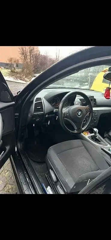 Gebraucht BMW 116 Basis 122 PS (89 kW) 2008 Schwarz Kleinwagen