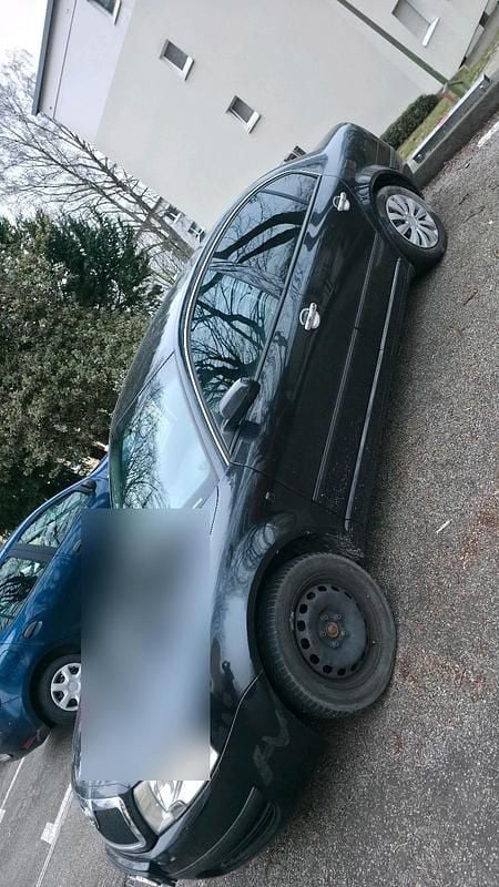 Second-hand Skoda Superb 140 CP (102 kW) 2005 Negru Berlinǎ