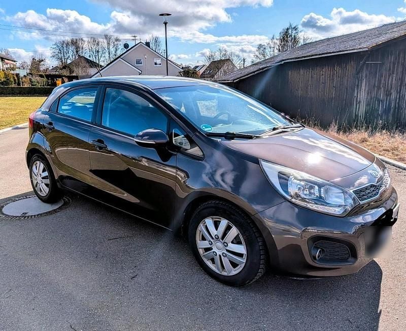 Gebraucht Kia Rio 109 PS (80 kW) 2012 Braun Kleinwagen