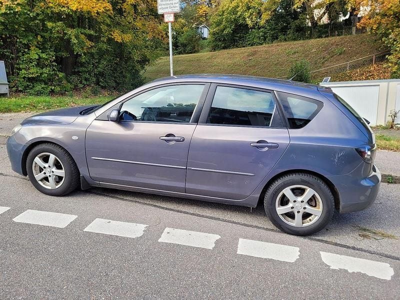 Grau Gebraucht 2006 Mazda 3 Exclusive Limousine | 2.099 € (Etwas zu teuer) - Bild 1/4