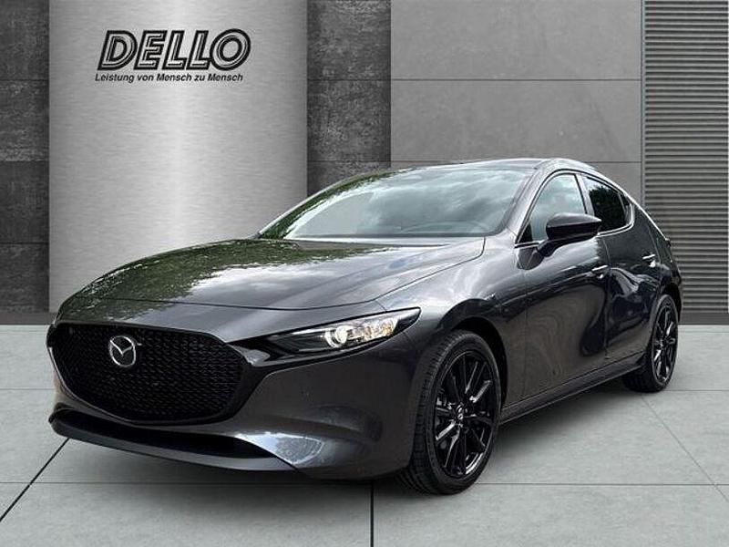Machine gray Gebraucht 2025 Mazda 3 Homura-Line Limousine | 28.980 € (Teuer) - Bild 1/4