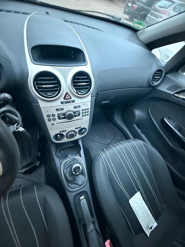 Używany Opel Corsa 90 KM (66 kW) 2007 Niebieski Hatchback