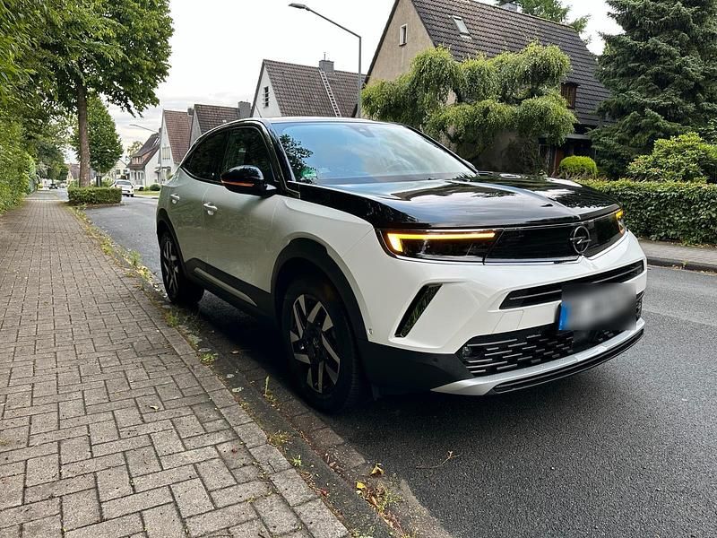 Weiß Gebraucht 2021 Opel Mokka-e Elegance SUV | 15.649 € (Fairer Preis) - Bild 1/4