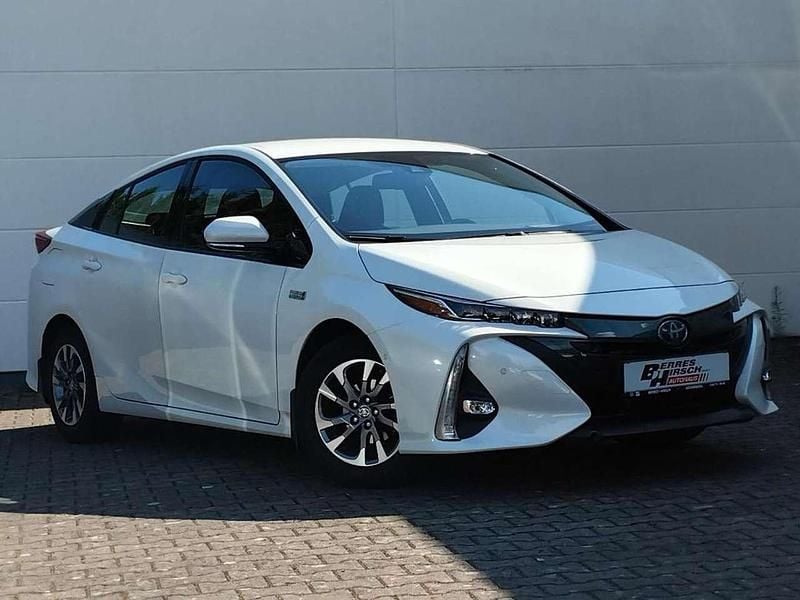 White pearl cs Gebraucht 2017 Toyota Prius Comfort Kleinwagen | 18.640 € (Fairer Preis) - Bild 1/4