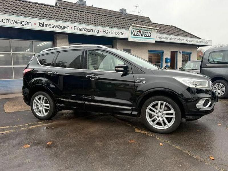 Iridium schwarz metallic Gebraucht 2018 Ford Kuga Vignale SUV | 18.890 € (Fairer Preis) - Bild 1/4