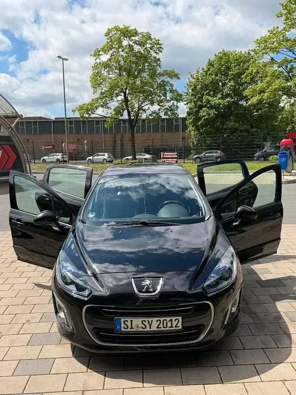 Gebraucht Peugeot 308 GTi 200 PS (147 kW) 2013 Schwarz Limousine
