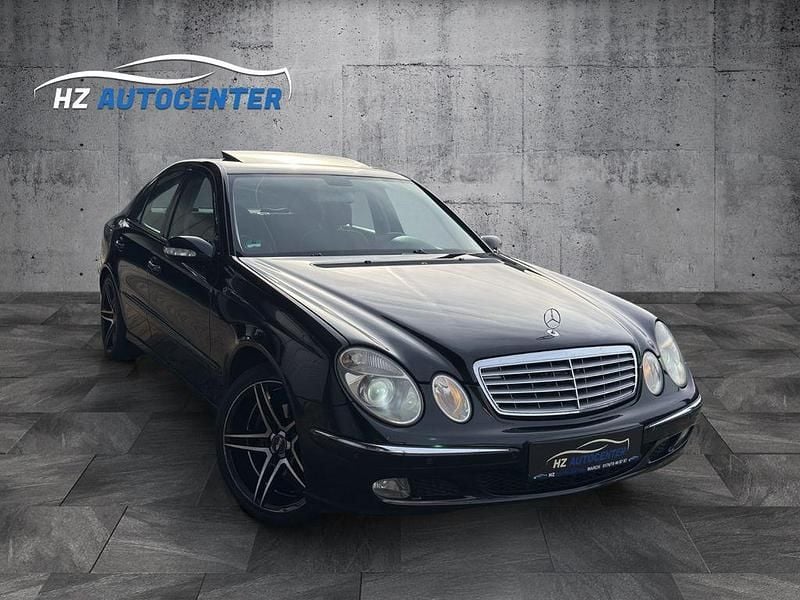 Second-hand Mercedes E200 163 CP (119 kW) 2004 Negru Berlinǎ