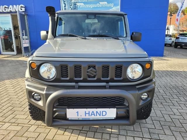 Gebraucht Suzuki Jimny Comfort 102 PS (75 kW) 2023 Solid medium gray SUV