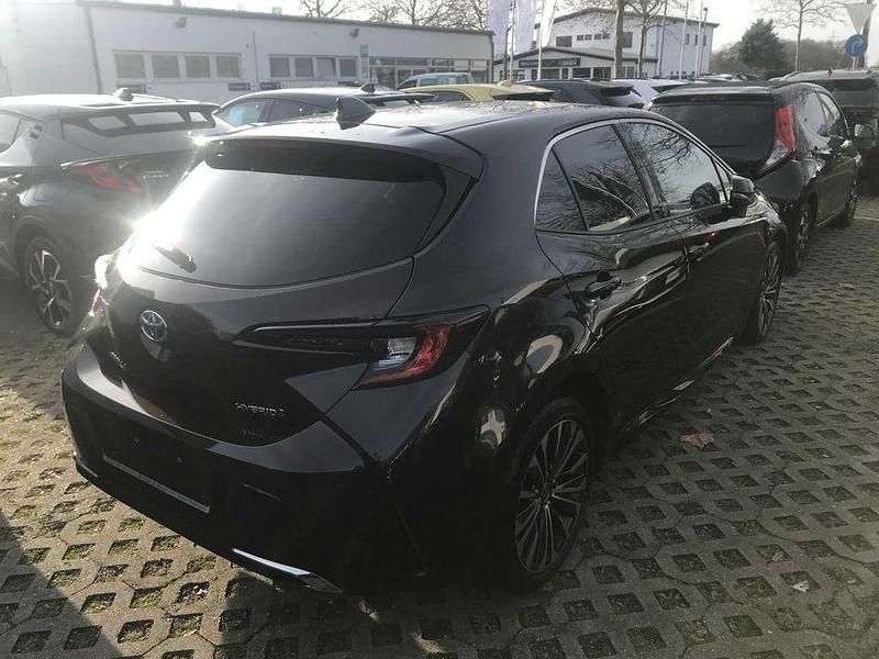 Gebraucht Toyota Corolla Hybrid Team 121 PS (88 kW) 2023 Phantombraun metallic Limousine
