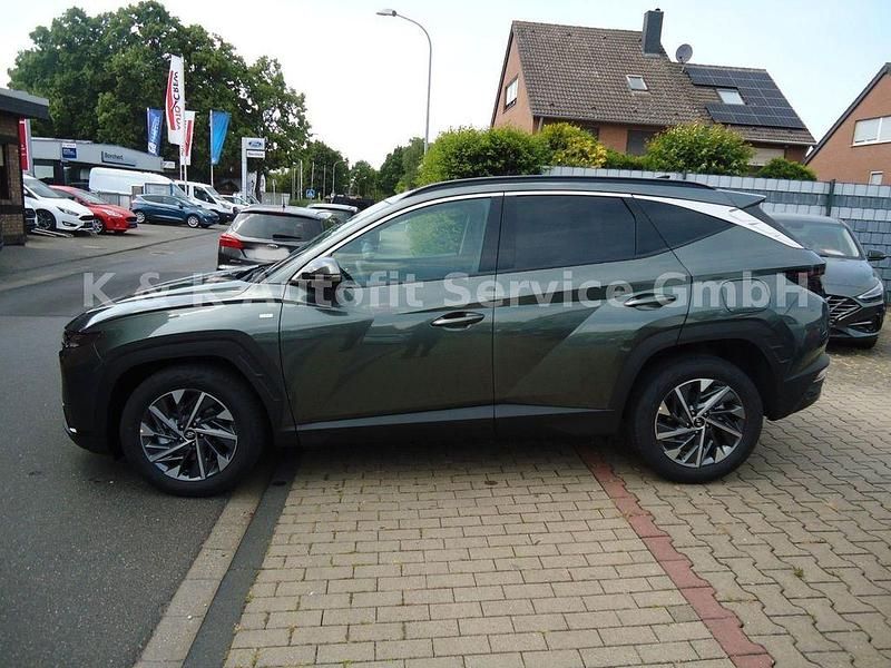 Grau Gebraucht 2023 Hyundai Tucson Comfort SUV | 32.200 € (Teuer) - Bild 1/4