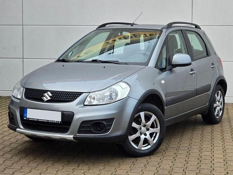 Grau Gebraucht 2012 Suzuki SX4 SUV | 6.990 € (Fairer Preis) - Bild 1/4