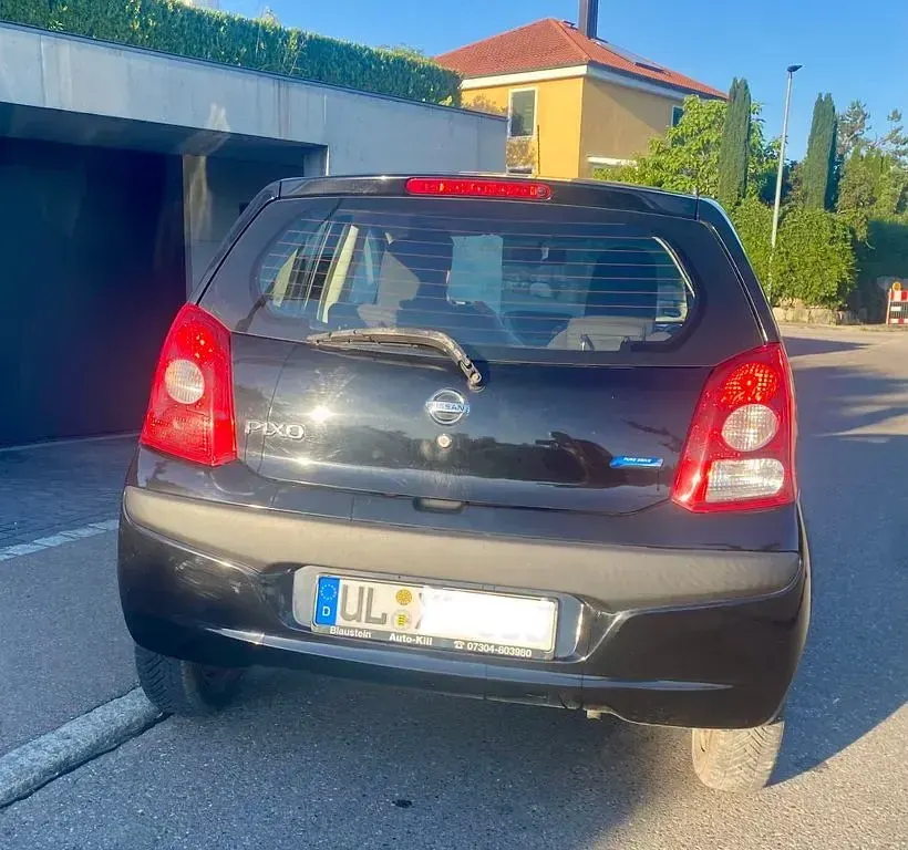 Gebraucht Nissan Pixo Acenta 68 PS (50 kW) 2011 Schwarz Kleinwagen