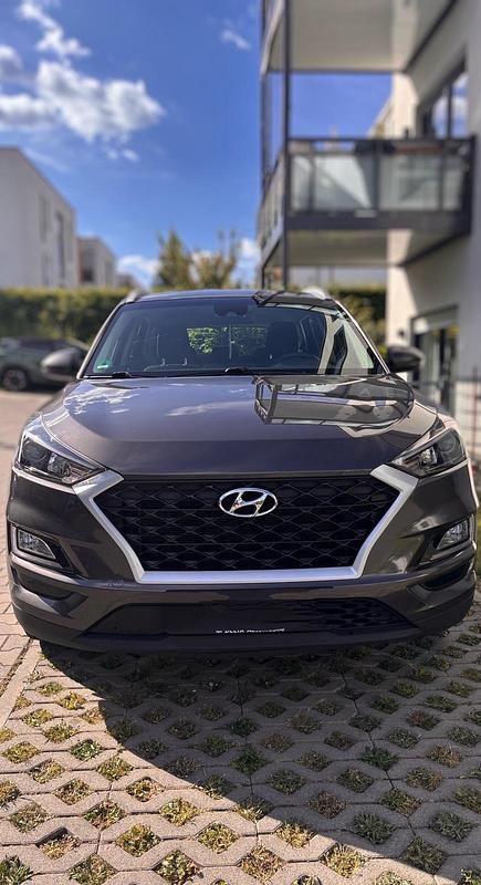 Braun Gebraucht 2018 Hyundai Tucson Select SUV | 14.995 € (Fairer Preis) - Bild 1/4