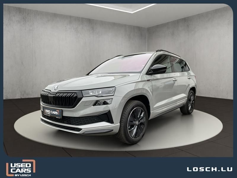 Grau Gebraucht 2024 Skoda Karoq SportLine SUV | 34.490 € (Fairer Preis) - Bild 1/4
