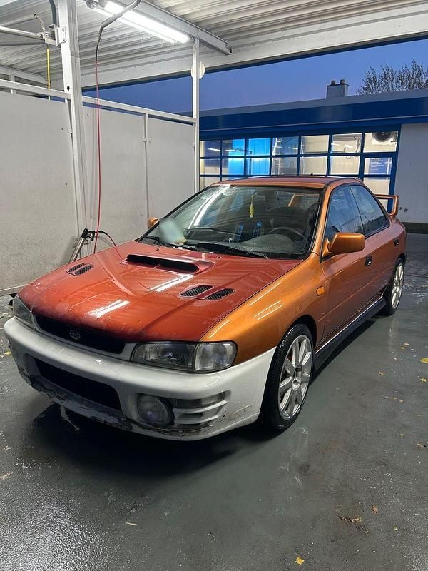 Gebraucht Subaru Impreza GT 125 PS (91 kW) 1996 Orange Limousine