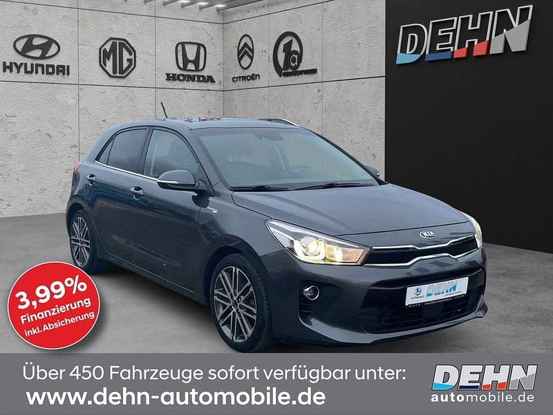 Graphite Gebraucht 2017 Kia Rio Platinum Edition Limousine | 12.490 € (Fairer Preis) - Bild 1/4