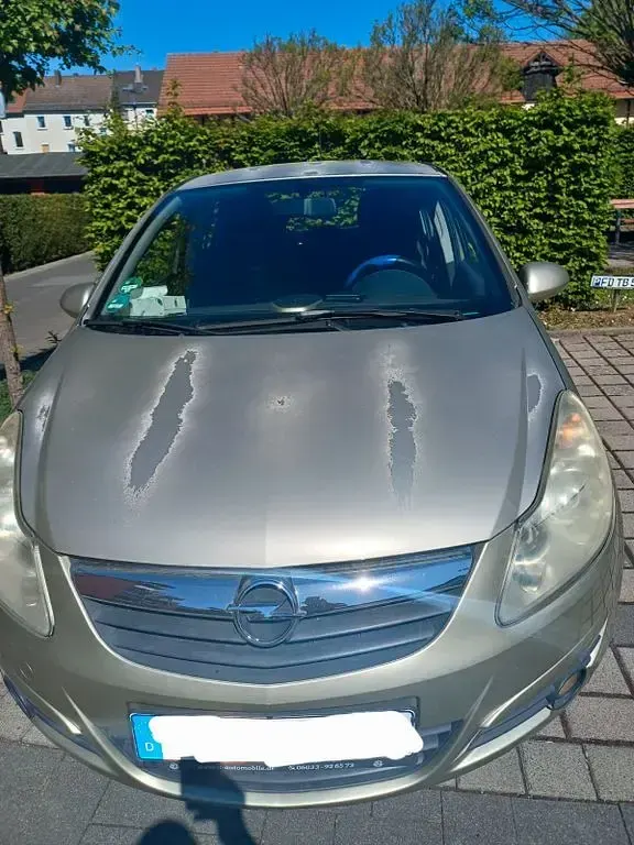 Usado Opel Corsa Edition 80 HP (58 kW) 2007 Cinzento Citadino
