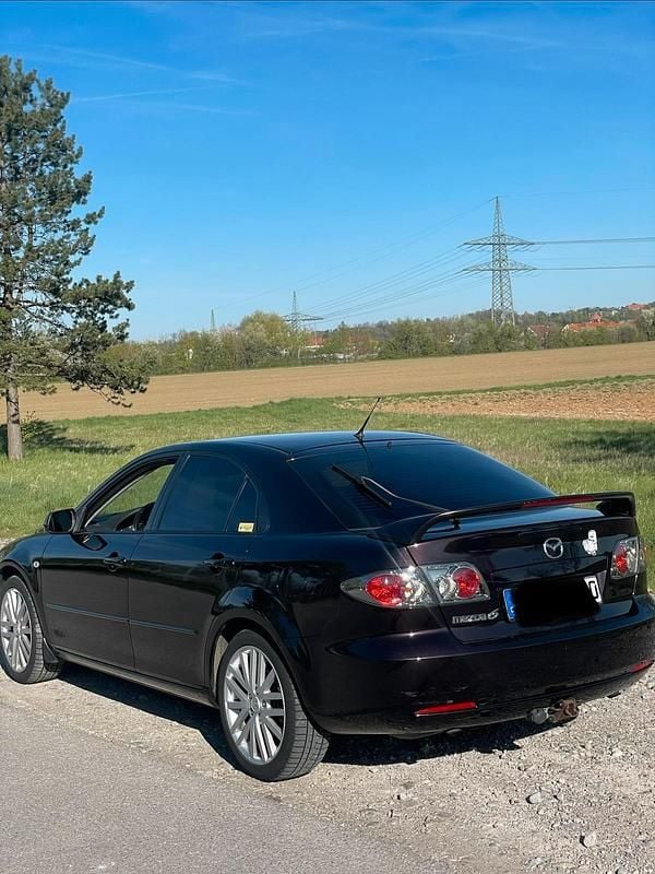 Używany Mazda 6 147 KM (108 kW) 2006 Purpurowy Sedan/Limuzyna