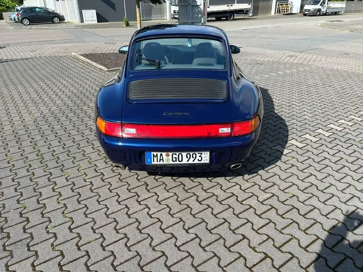 Gebraucht Porsche 911 Carrera 272 PS (200 kW) 1994 Irisblaumetallic Coupé