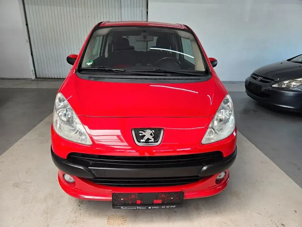 Gebraucht Peugeot 1007 Premium 73 PS (53 kW) 2006 Rot Van / Kleinbus