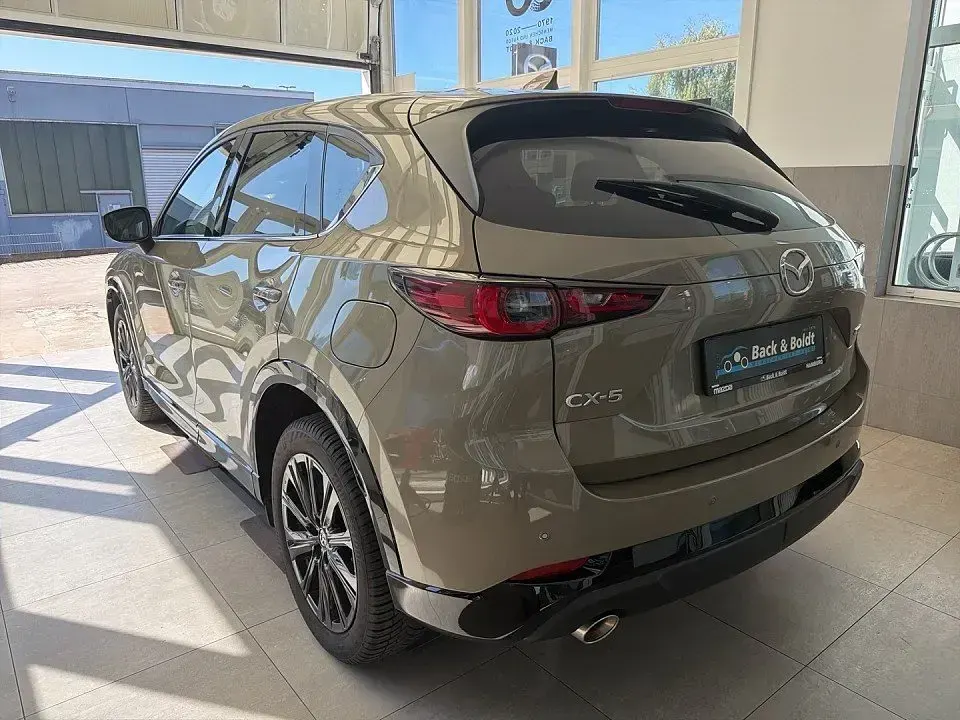 Gebraucht Mazda CX-5 Homura-Line 194 PS (142 kW) 2023 Zircon sand SUV