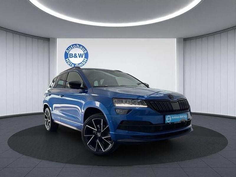Raceblau metallic Gebraucht 2021 Skoda Karoq SportLine SUV | 20.999 € (Guter Preis) - Bild 1/4