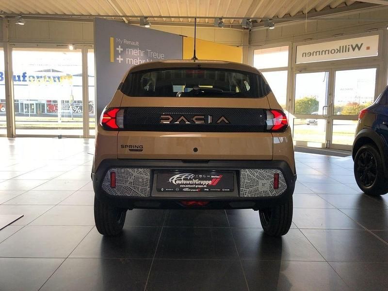 Gebraucht Dacia Spring Extreme 47 kW (65 PS) 2024 Beige Kleinwagen