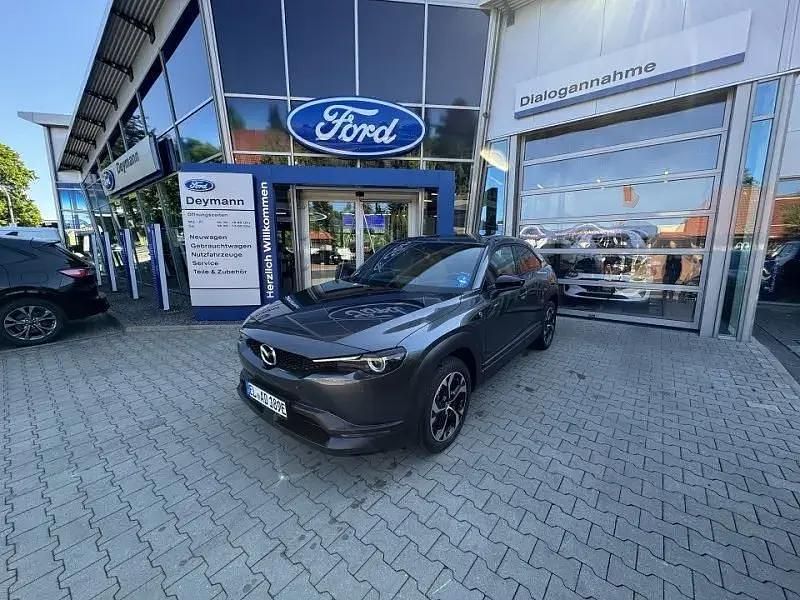 Grau Gebraucht 2024 Mazda MX30 Makoto SUV | 22.890 € (Superpreis) - Bild 1/4