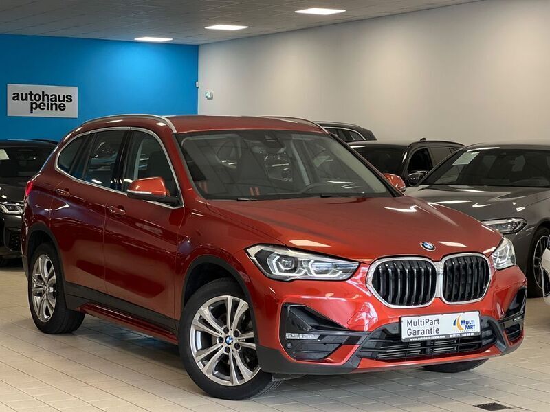 Sunset orange metallic Gebraucht 2019 BMW X1 Sport Line SUV | 23.297 € (Fairer Preis) - Bild 1/4