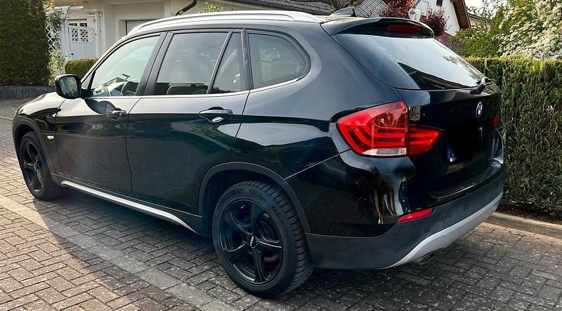 Używany BMW X1 204 KM (150 kW) 2011 Czarny SUV