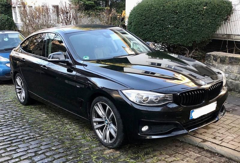 Schwarz Gebraucht 2013 BMW 320 Gran Turismo Sport Line Limousine | 9.400 € (Fairer Preis) - Bild 1/4